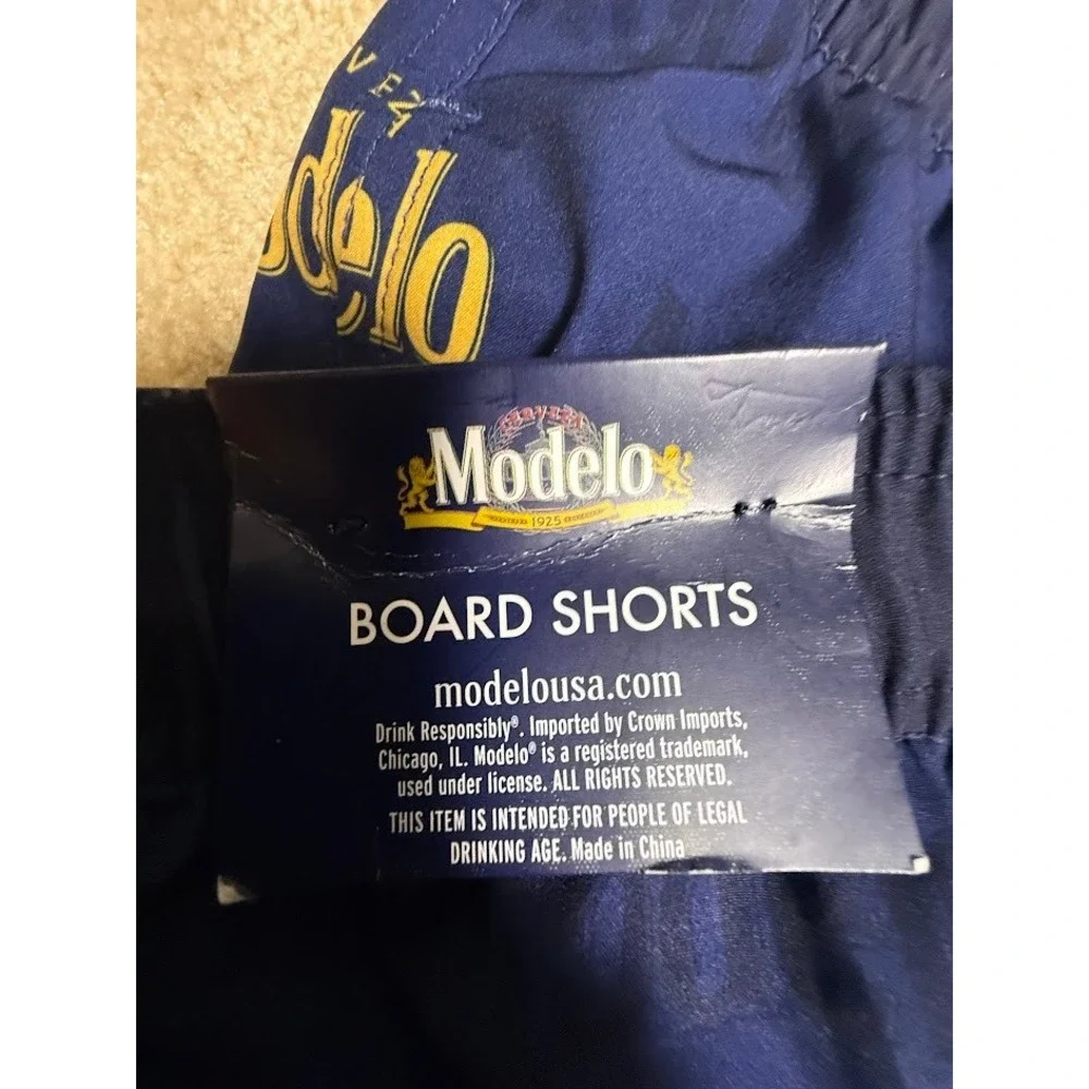 Modelo Cerveza Mens Navy Blue Gold Logo Board‎ Shorts Swim Trunks Size XXL NWT